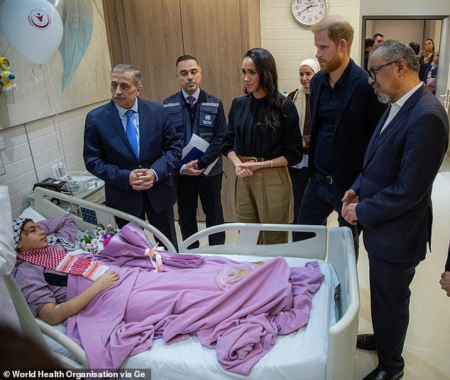 The Duke and Duchess of Sussex meet a young medical evacuee during a visit to the Specialty Hospital on February 26, 2026 in Amman, Jordan