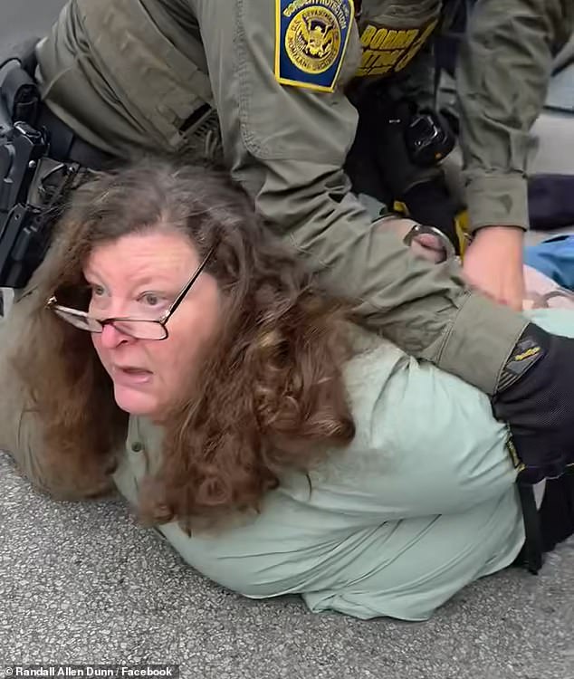 Brockman allegedly threw something at their vehicle, according to the Department of Homeland Security (DHS)