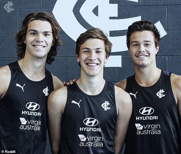 Tom (middle) with his brothers Ben (left) and current AFL footballer Jack (right)