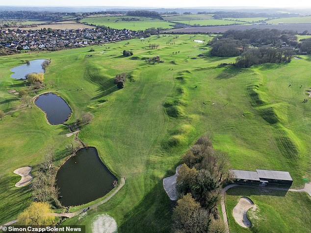 Fury as one of Britain's biggest developers unveils plans to build 1,200 homes on 170-acre golf course near historic cathedral city of Winchester