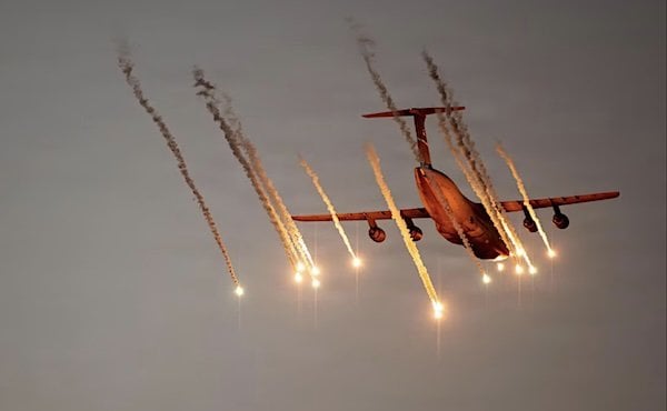 A C-5M Super Galaxy assigned to the 436th Airlift Wing at Dover, Delaware, conducts flare-testing operations to evaluate enhanced survivability systems at Eglin Air Force Base, Florida, Feb. 12, 2026. (U.S. Air Force photo by Master Sgt. J.D. Strong II)