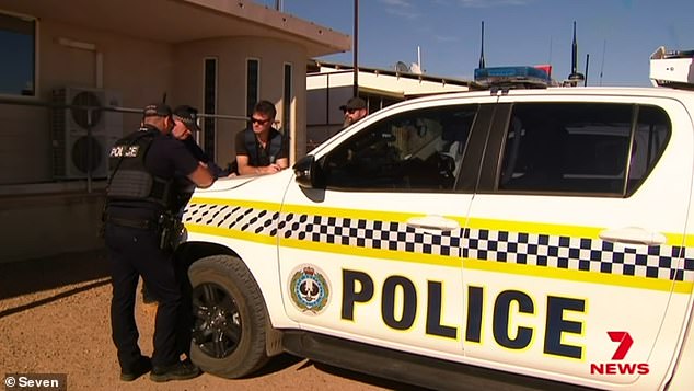 Police converge on Andamooka, six hours north of Adelaide, on Monday