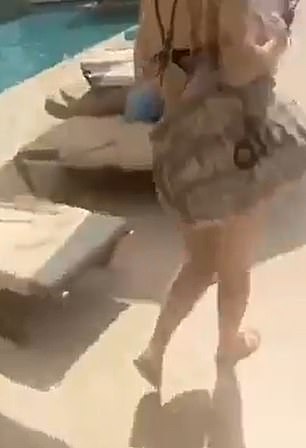 A woman filmed by her friend as airstrikes are taken out of the sky in Dubai