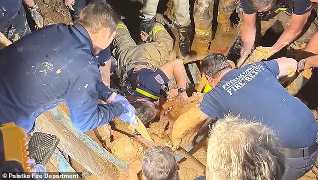 Miraculous moment man missing for TEN days is found trapped up to his shoulders in mud
