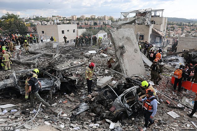 The aftermath of an Iranian rocket hitting Beit Shemesh, which killed eight people