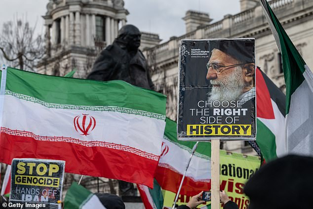 A demonstration in Parliament Square saw activists brandish placards showing a portrait of Iran's Supreme Leader Ayatollah Ali Khamenei.