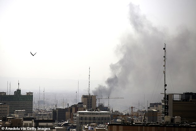 Smoke billows into the sky of Tehran after Israel launches a second wave of airstrikes on February 28, 2026