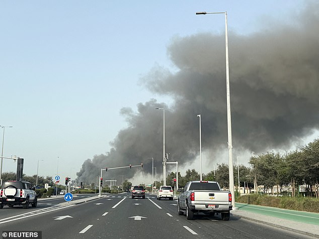 Smoke billows from Zayed Port in the UAE after Iranian retaliatory strikes on Sunday
