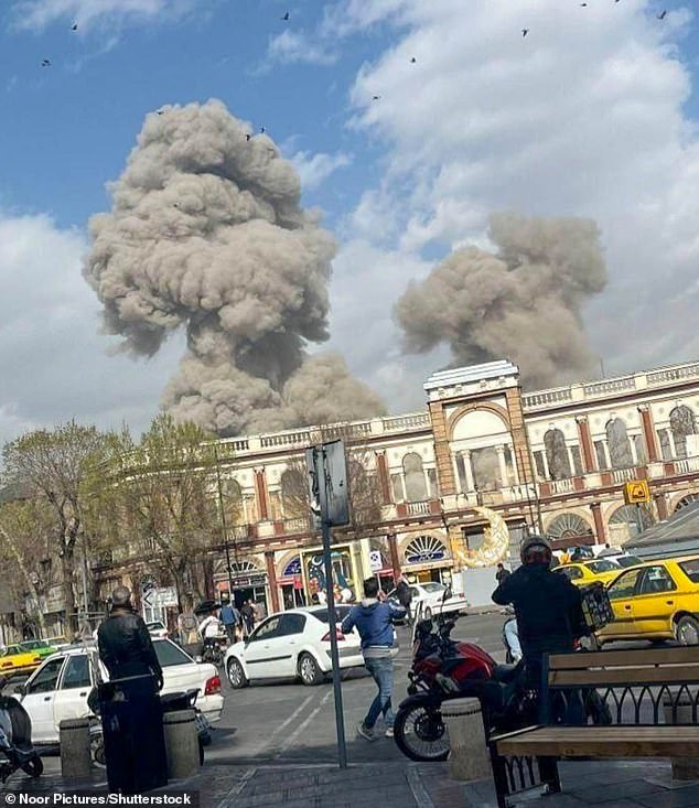 Explosions were seen and heard across parts of the Iranian capital, with smoke rising above residential areas