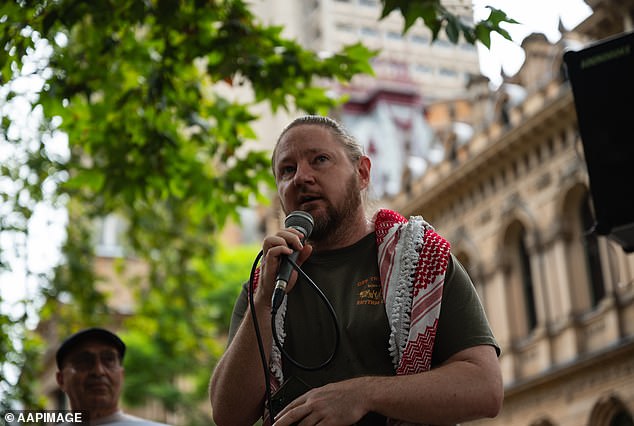 Professional protester Josh Lees (above) spoke at the Socialist Alliance rally