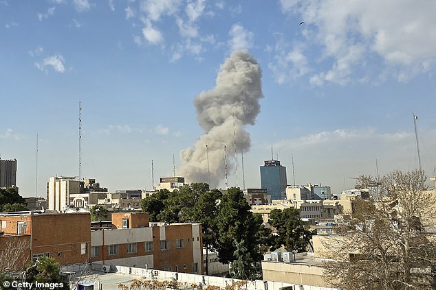 An image shows smoke billowing from a building after an explosion in Tehran, Iran, on Saturday morning