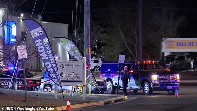 Police are seen investigating the scene at a Fairfax County, Virginia, bus stop