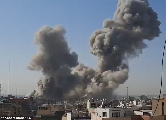 Footage shows smoke billowing into the sky above Khamenei's complex