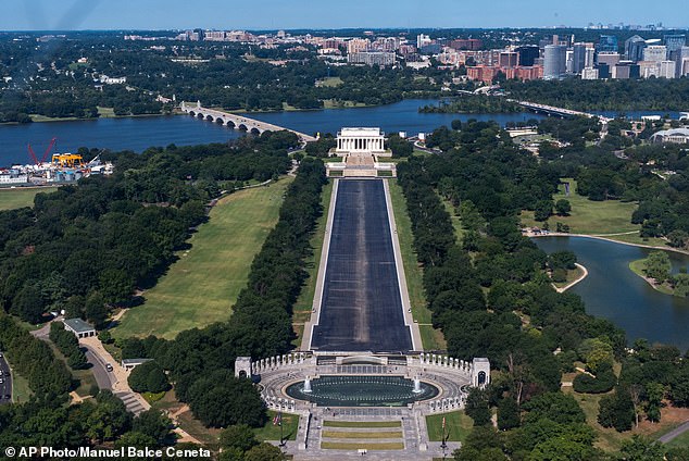 The Lincoln Memorial Reflecting Pool between the Lincoln Memorial, top, and the World War II Memorial, bottom, is shown