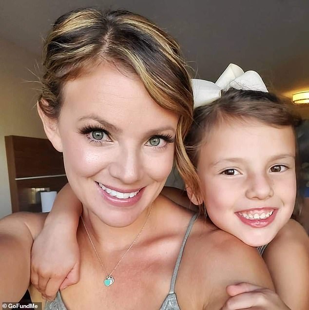 Miller has three sons and a daughter. She is pictured above with her daughter in an old photo