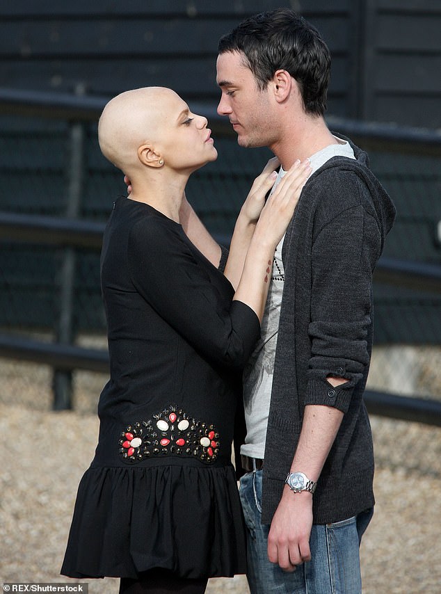 The couple are pictured outside their home in Essex just one day before their wedding in February 2009. Ms Goody died one month later from cervical cancer