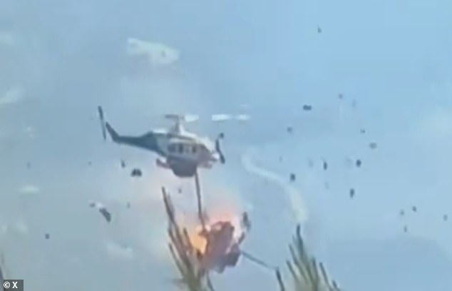 Greek and Dane are killed in mid-air helicopter crash while fighting wildfires: British pilot is among the survivors