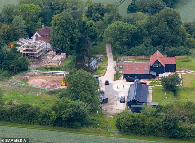 Ed's Sheeran-ville Mark II takes shape: Star's converted former piggery into 'countryside Abbey Road' recording studios with man cave, bar, gym, pool table and bowling alley... now he wants to transform the outbuildings