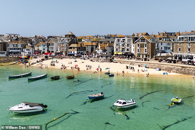 Cornwall is one of Britain's most popular holiday spots, with nearly 25,000 active holiday rentals. Pictured: St Ives