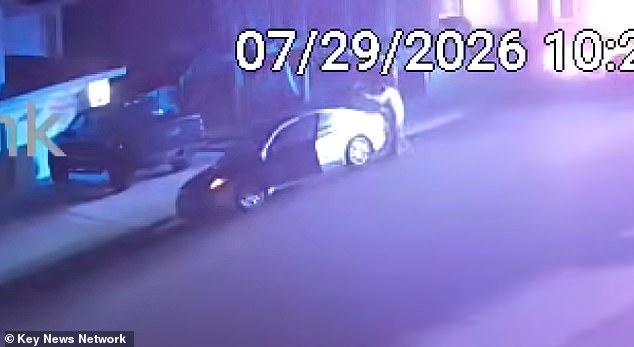 Jianquan is seen here in home surveillance footage shooting Aikebaer in the trunk of the car before he was shot dead by deputies