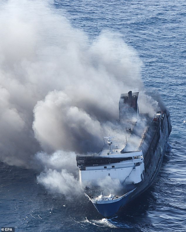 At least five dead and dozens missing after ferry carrying 100s catches fire in Indonesia