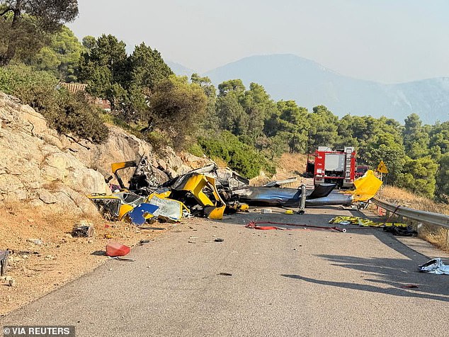 Wreckage of the helicopter strewn across a road near Psatha on Sunday evening