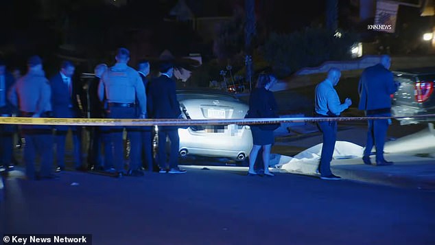 Aikebaer was shot dead in the trunk of the car, while Jianquan was shot seconds later by deputies. His body is seen on the right covered by a tarp