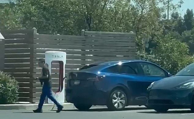 After moving to a nearby parking lot from the drive-thru, a witness said the gunman 'was panicking... He was not very calm and collected, running and slinging his rifle around firing'