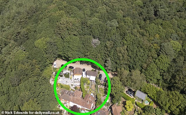 Houses further up Hosey Common Road, which are not under a hosepipe ban, have greener gardens