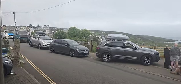 Long queues for car parks in St Ives are a common sight in the peak summer season