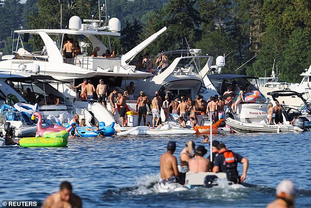 Mercer Island authorities have warned that Lake Washington 'can be overwhelming' during Seafair weekend because of the massive boat traffic (Previous photo of the lake)