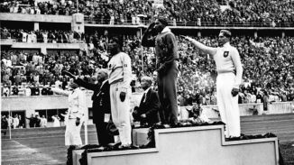 Jesse Owens wins in 1936 Berlin Olympics