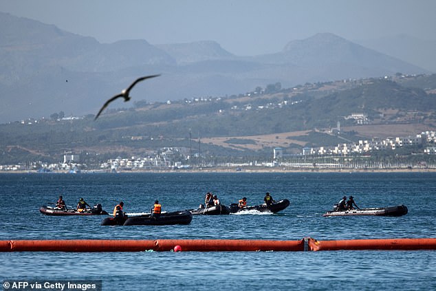 Spanish authorities have installed a 1,600ft-long barrier along Ceuta¿s Tarajal breakwater, a stretch of coast used by migrants during Thursday¿s crossings