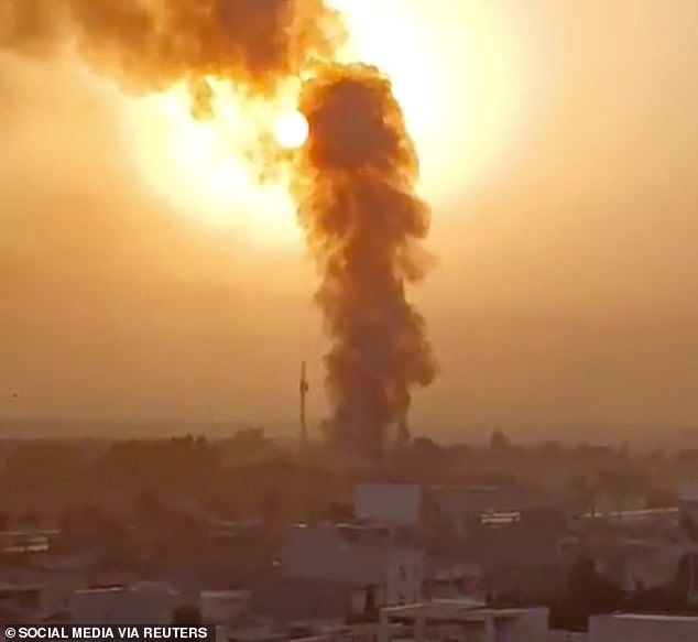 Smoke rises after reports of multiple U.S. strikes on the city, as loud explosions were heard according to the Iranian state TV