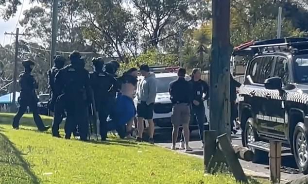 The man was arrested at a unit complex across the road from the shopping centre an hour later