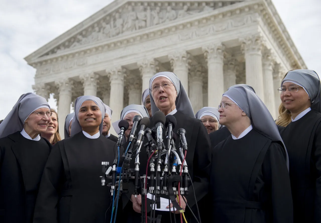  Loraine Marie Maguire (C), mother provincial of the Little Sisters of the Poor, stands alongside fellow nuns and co-plaintiffs following oral arguments in 7 cases dealing with religious organizations that want to ban contraceptives from their health insurance policies on religious grounds at the Supreme Court in Washington, DC, March 23, 2016. (Photo by SAUL LOEB/AFP via Getty Images)