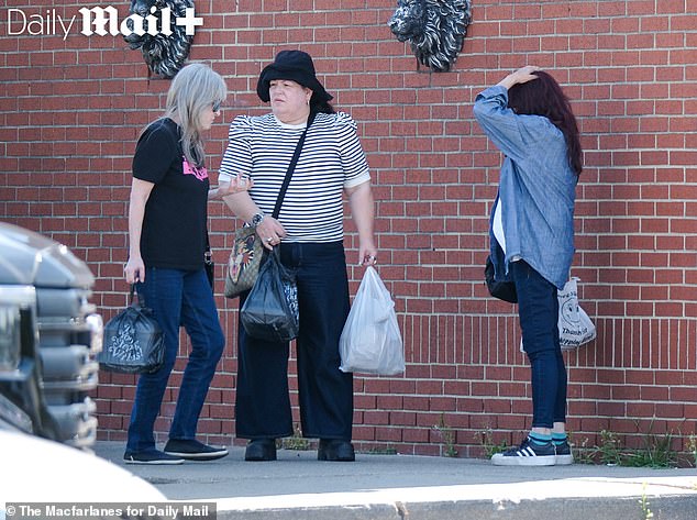 Meg chatted with her two friends after enjoying a long lunch in a mom-and-pop Italian restaurant