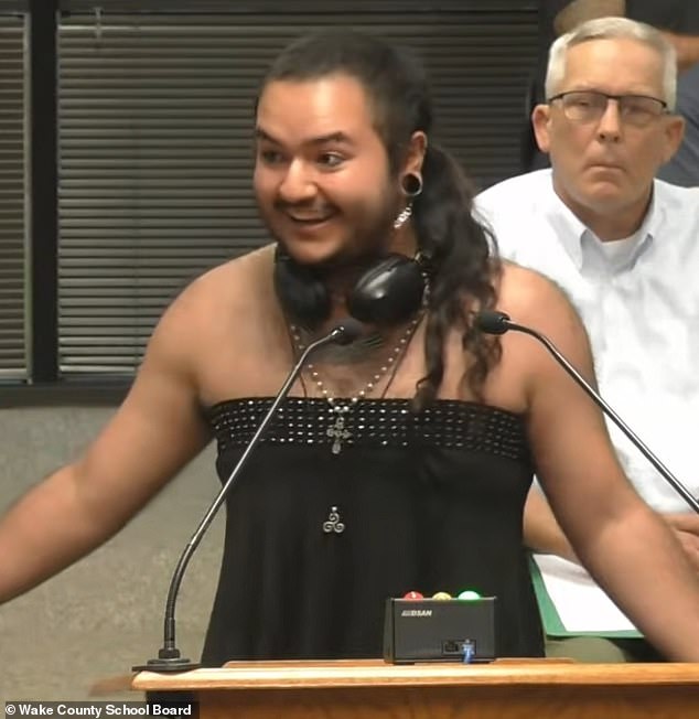 A transgender man, who was called by Christina, argued that parents who wanted to change the dress code would want someone like them to dress as they had appeared at the meeting, in women's clothing, as they transitioned from female to male