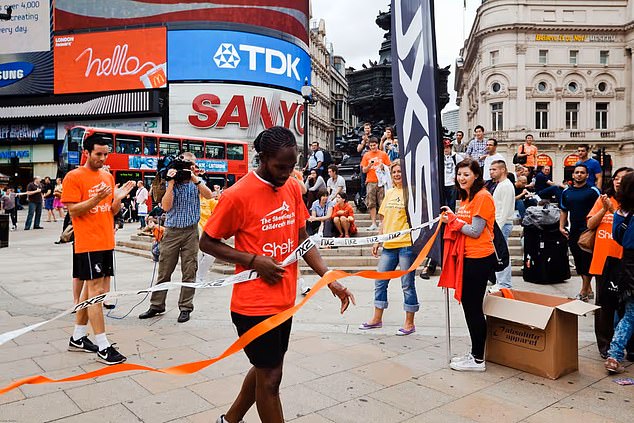 Cambridge 'plagiarism' professor claimed he ran nine marathons with broken leg that 'ballooned to twice the size'... but photos of him at the finish line tell a different story