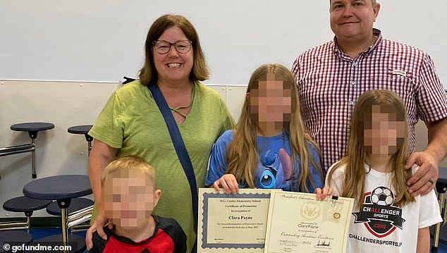 Payne was an employee at NIST for 29 years and was close to retirement. He is pictured with his wife and three of his children
