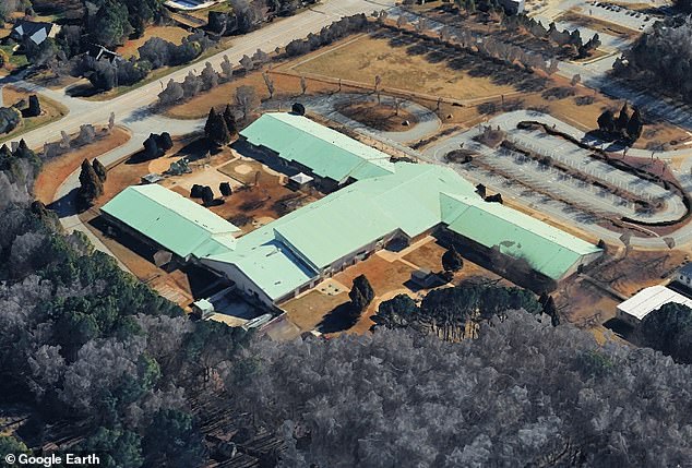 Southern elementary school erupts as parents bitterly divided over new transgender teacher... with furious families clashing over claims children are 'too young' for a 'biological male in a dress'