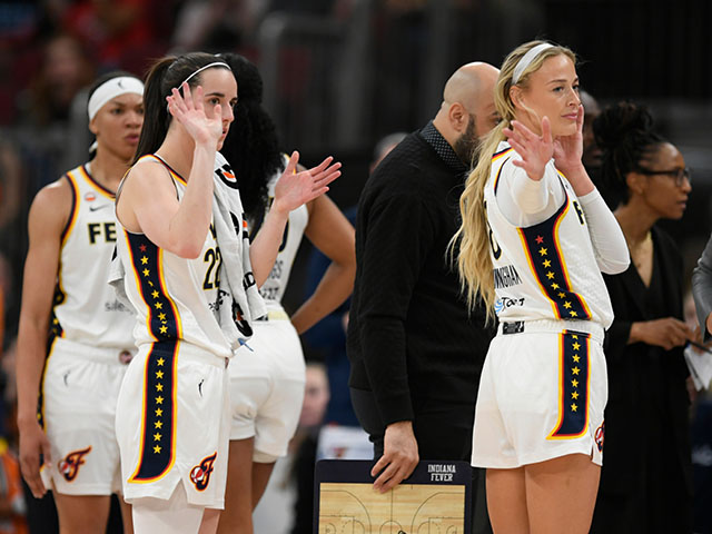 Title: Fever Sky Basketball Image ID: 26221144081916 Article: Indiana Fever's Sophie Cunningham, right, and teammate Caitlin Clark, left, wave goodbye to Chicago Sky's DiJonai Carrington after Carrington was ejected from the game for committing a flagrant foul against Cunningham during the first half of an WNBA basketball game in Chicago, Saturday, Aug. 8, 2026. (AP Photo/Paul Beaty)