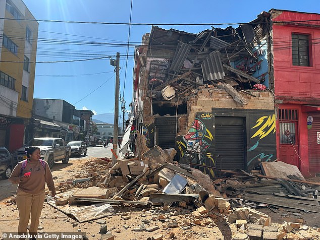 People gather in the streets after a powerful earthquake struck Colombia, killing dozens and causing damage in Pereira, Colombia, on August 10, 2026