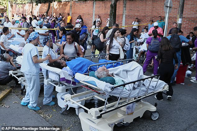 Patients are evacuated outside a hospital after an earthquake struck Cali, Colombia, on August 10, 2026.