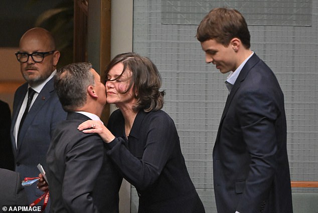 Angus Taylor's wife Louise Clegg (centre) travelled to Canberra without taxpayer funds