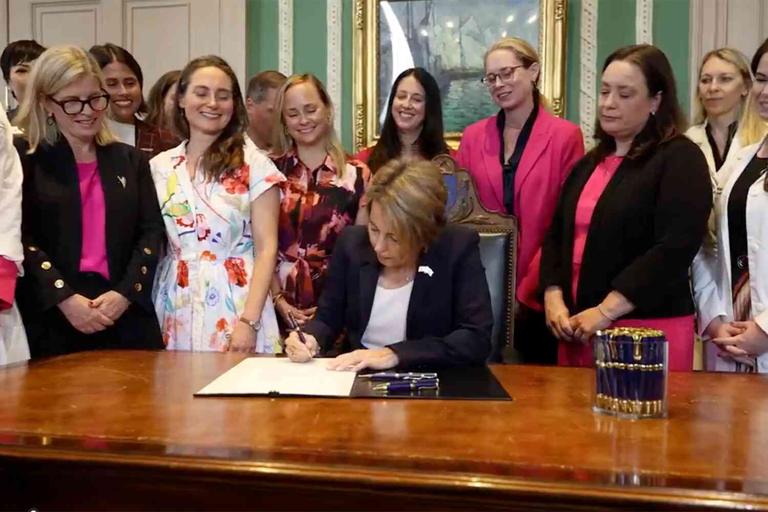 Thumbnail for Women applaud as Massachusetts governor signs bill allowing abortion until the moment of birth