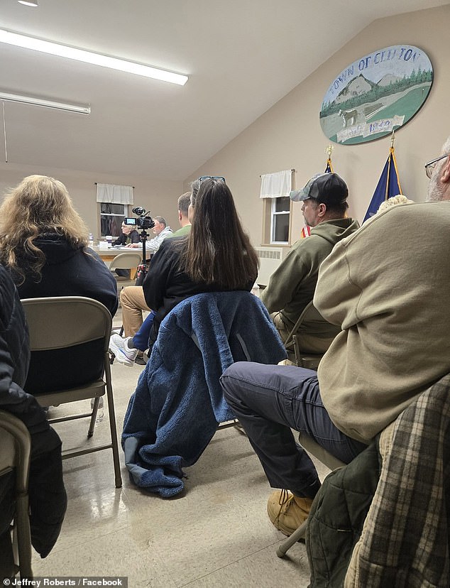 Clifton residents attend a town meeting amid an increasingly bitter political divide fueled by rival local Facebook groups