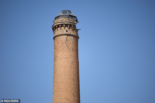 Cracks on a damaged tower in the city today... Granada is home to the world-famous Alhambra medieval Islamic palace