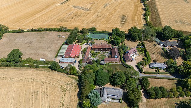 Keith Richards' home in West Sussex has a small green patch at the centre, but other grass on the property is struggling