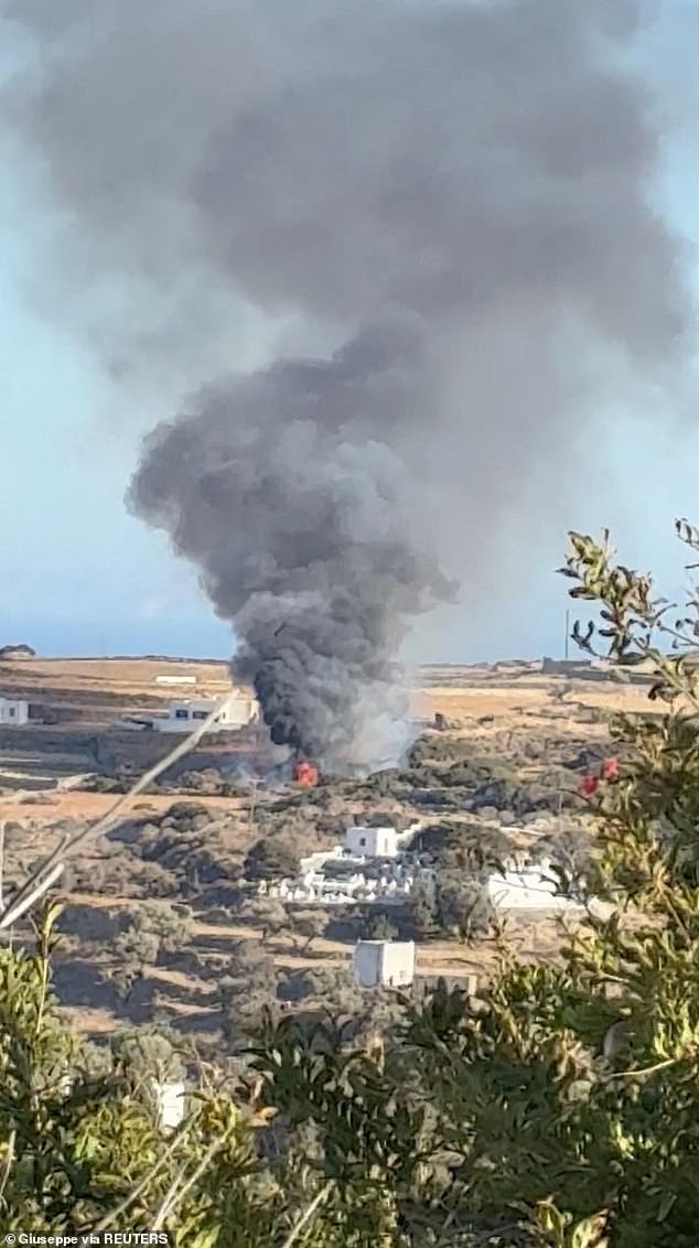 Further footage shows the helicopter immediately engulfed in a fireball, with smoke seen billowing into the sky from the blackened wreckage